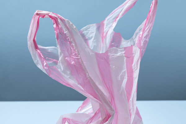 high-angle-plastic-bag-blue-background